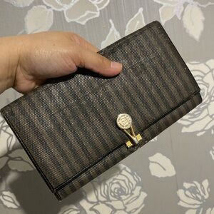 Fendi long wallet. Lots of deep scratches and paint peeling and scratches.